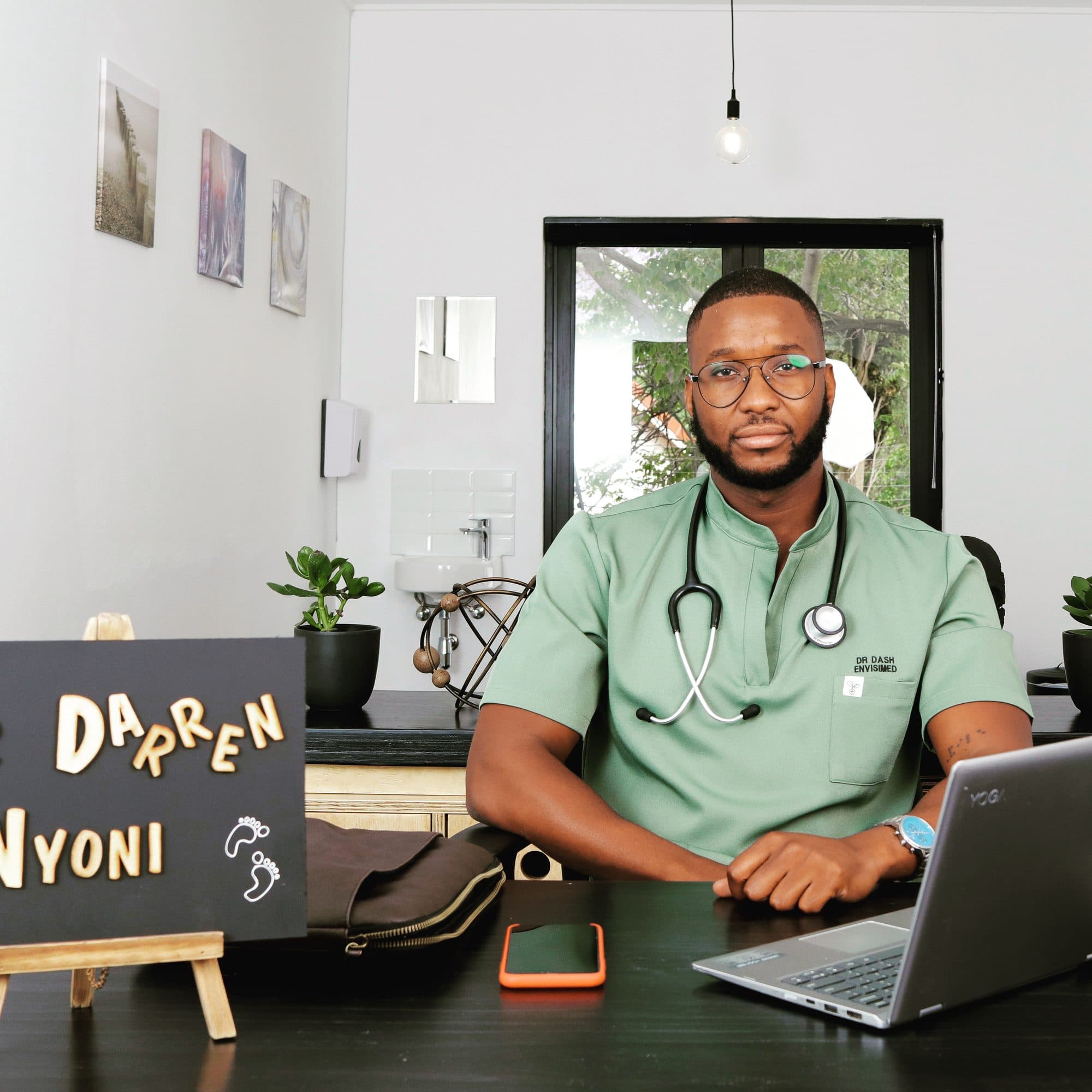 Dr Darren Nyoni in a clinical setting — professionalism and clinical confidence